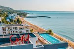 Hotel s bazénom a pláž